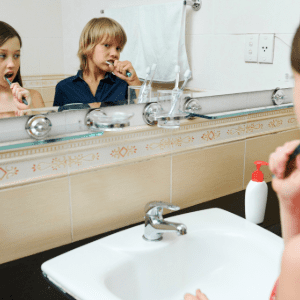 Kids brushing their teeth and getting ready for back-to-school